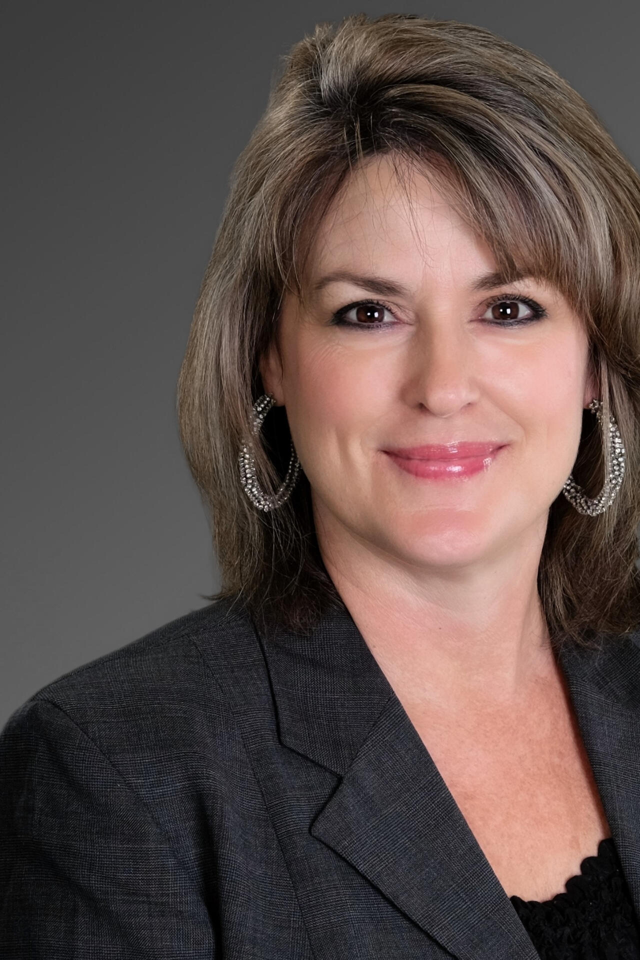 Traci Christenson, Broker